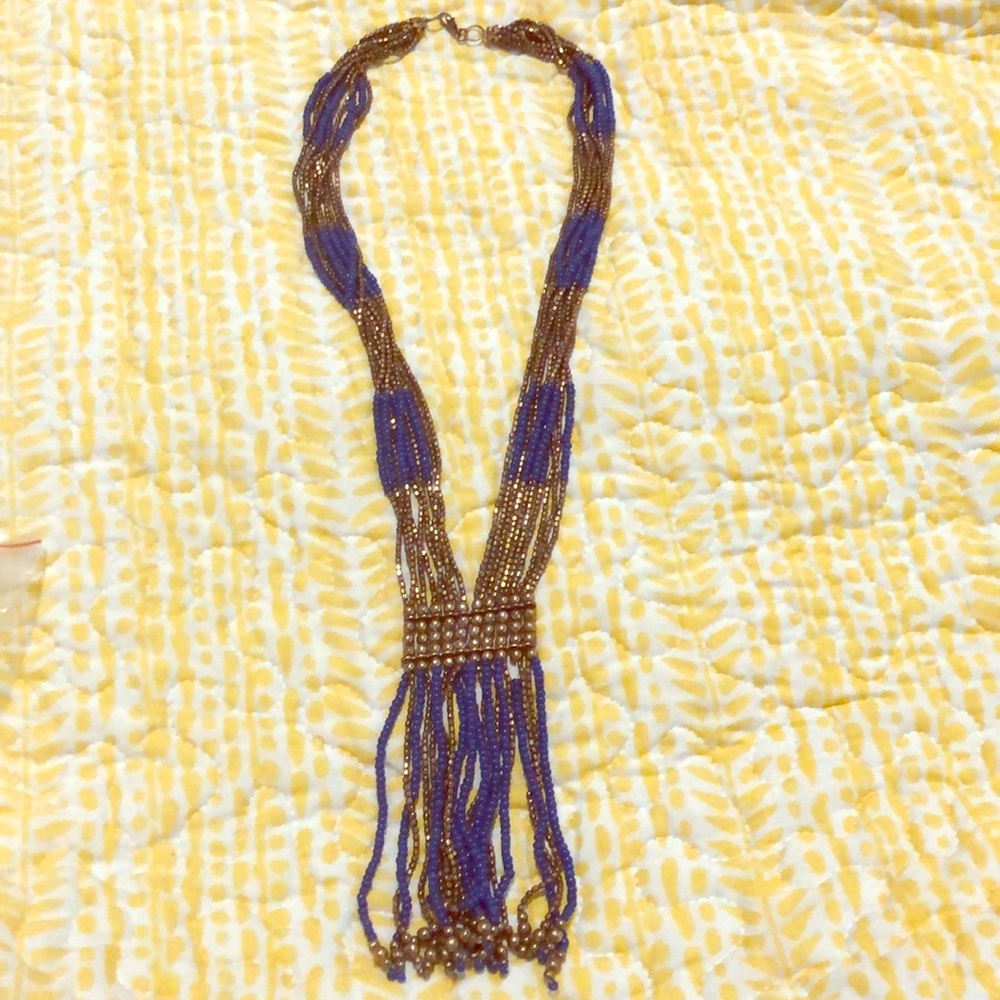 Purplish blue and gold necklace with tassels